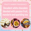 Load image into Gallery viewer, A graphic reads: Fruity Amber Fragrance—decadent white chocolate, passion fruit, mandarin & sparkling tea. Ideal for Fresh Scents' Little Sparkle Sachet 3pk flameless air freshener. Images: white chocolate, passion fruit, iced tea with orange slice.
