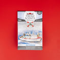 Load image into Gallery viewer, The Fresh Scents Watermark - Sachet 3pk features a nautical design with a watercolor boat and life preserver, offers flameless fragrance, and is shown on a vibrant red background.
