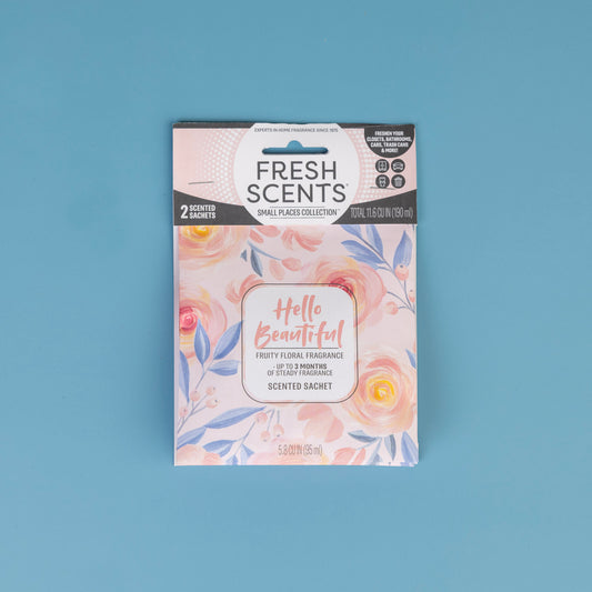 Fresh Scents Hello Beautiful - Sachet 2pk features a floral design on blue and offers a fruity floral flameless air freshener, perfect for small spaces in your home.