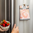 Load image into Gallery viewer, A hand holds a bowl of strawberries, capturing the fresh, fruity aroma of Fresh Scents Summer Romance Sachet 3pk air fresheners.
