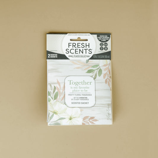 Fresh Scents Together - Sachet 2pk features a floral design on beige and the message "Together is my favorite place to be." Enjoy a fruity floral scent—ideal as a flameless air freshener for small spaces.